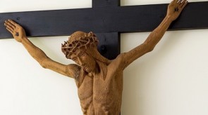 18. Crucifix. Alter in a chapel. Torso.
